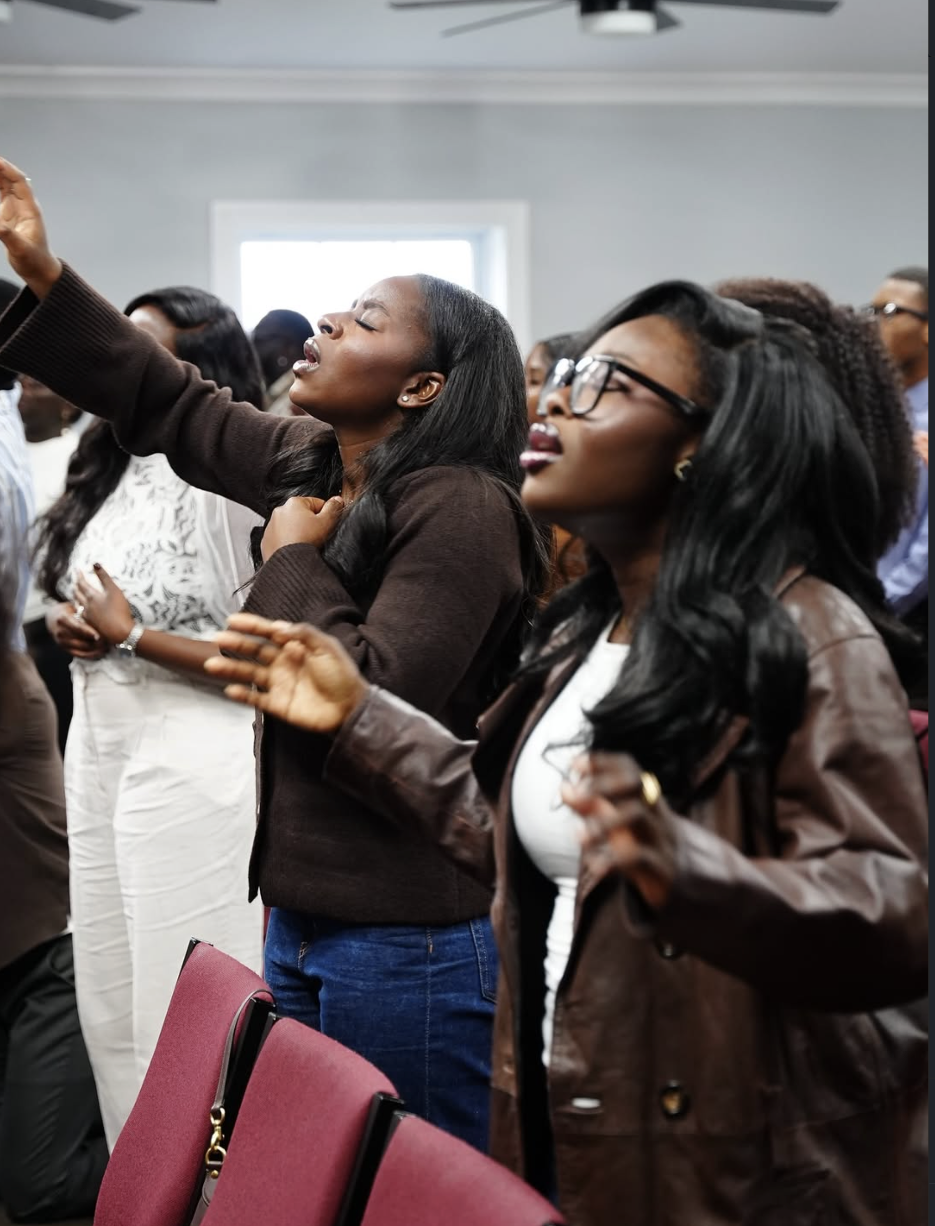 Hands Raised in Prayer